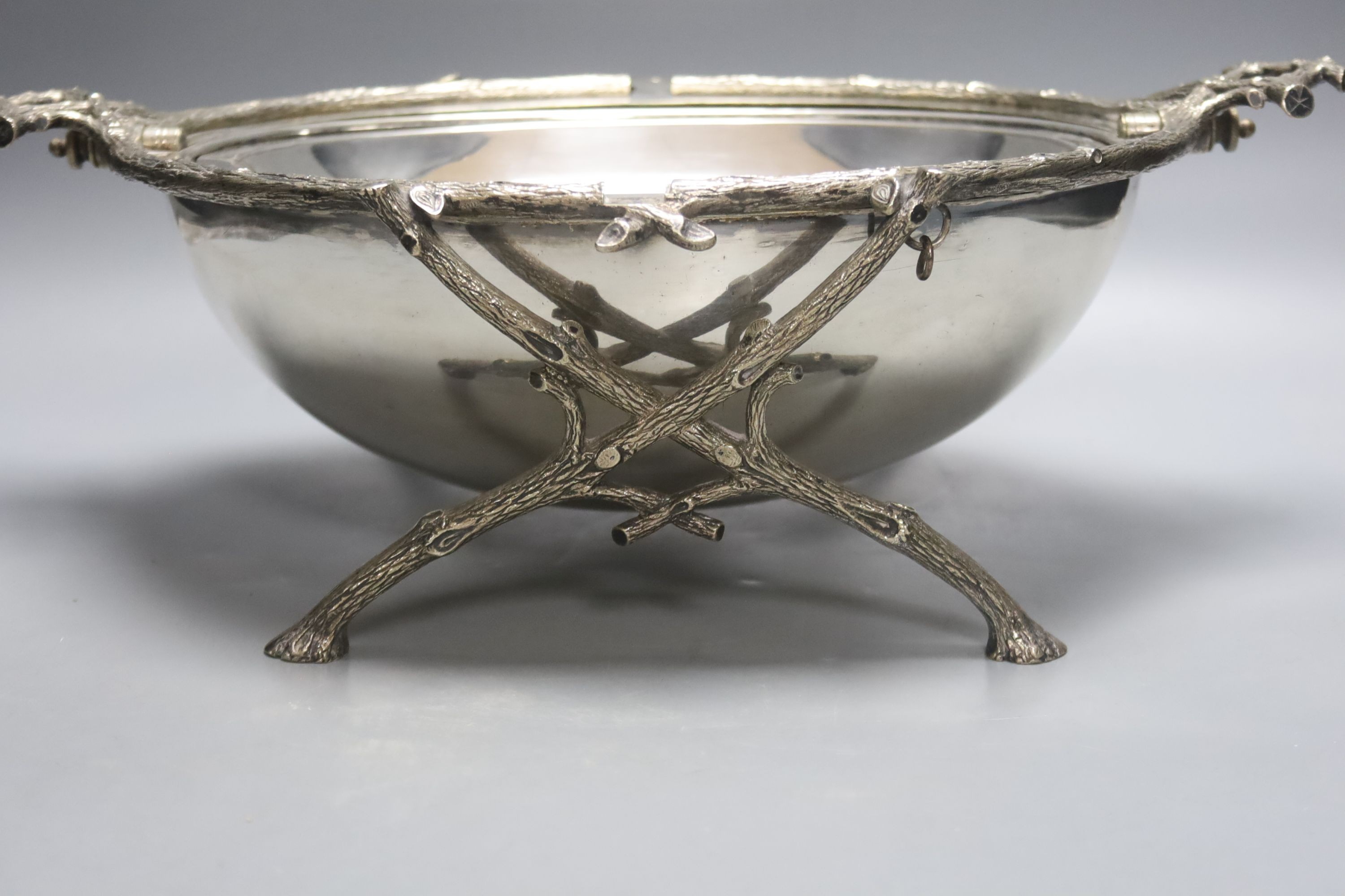 A pair of Victorian silver plated meat covers, 30cm and a similar roll-top breakfast dish (3)